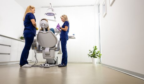 female-dentist-with-assistant-working-in-dental-cl-2025-01-29-07-57-05-utc